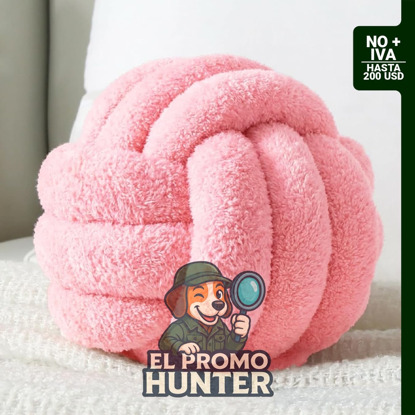 Cojín de felpa con nudo de 20 cm en color rosa.